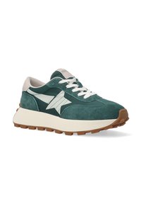 Grüne Wildledersneaker mit einem weißen Sternmuster, einem beigen Absatz und Schnürsenkeln, dicke cremefarbene Sohle und strukturiertem Gummi-Außensohle.