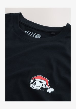 Črna bombažna majica s kratkimi rokavi, okroglo ovratnico in vezenjem v beli in rdeči barvi, ki prikazuje Felixa mačko v božični kapici.