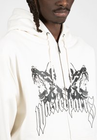 Wasted Paris HOODIE ZIP UNLEASHED UNISEX - Φούτερ με φερμουάρ - off-white