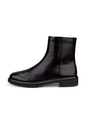 Bottine noire en cuir avec talon bas et texture lisse, vue de côté, semelle unie et détails de couture minimaux.