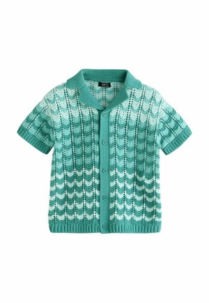 Stickad kortärmad cardigan i ljus och mörk teal, med ett vågmönster, ribbat avslut och krage, samt knäppning med knappar.