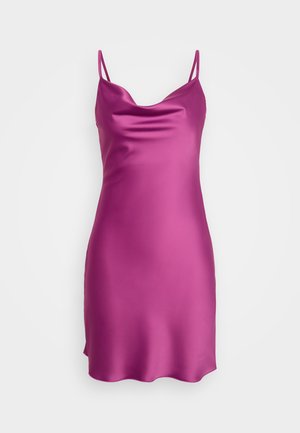 Satin pink slip dress with thin spaghetti straps, cowl neckline, and a smooth texture. Hemline features a subtle scalloped edge.