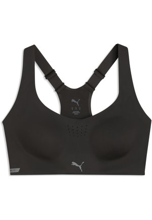 Sort sports-BH med racerback stropper, formstøbte skåle, små ventilationshuller foran og refleksivt Puma-logo centreret under brystet.