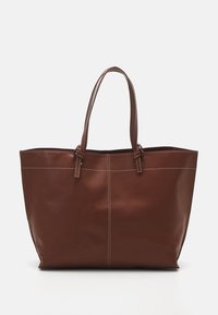 Brown leather tote bag with double handles, features contrast stitching and a spacious design, suitable for everyday use.