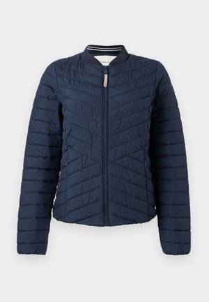Námořnická padací bomber bunda s vertikálním prošíváním, žebrovaným límcem a zapínáním na zip. Hladká textura látky s elastickými manžetami.