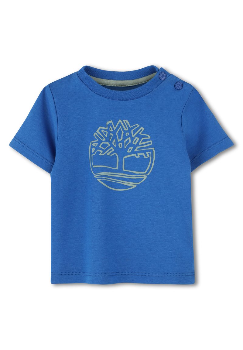 Blauwe katoenen t-shirt met korte mouwen, voorzien van een groene boomafbeelding op de voorkant en twee drukknoopjes op de schouder.