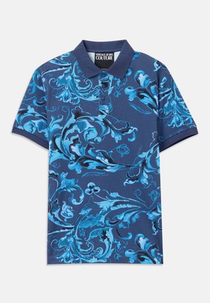 Mornarski polo majica s plavim cvjetnim uzorkom spirale, kratkih rukava i ovratnikom na gumbi. Izrađena od pamučne tkanine, glatke teksture.