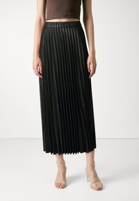 Black pleated skirt made of a smooth material, featuring a high waistband and a flowing design, reaching mid-calf length.