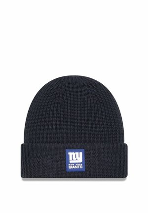 Bonnet en tricot bleu marine foncé avec un revers, orné d'un logo en patch bleu indiquant "ny New York Giants".