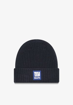 Bonnet en tricot bleu marine foncé avec un revers, orné d'un logo en patch bleu indiquant "ny New York Giants".