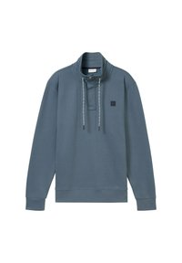 Sweatshirt bleu en tissu doux, avec un col montant, des boutons, des cordons de serrage et un petit logo sur le devant.