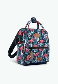 Floral backpack with navy background, featuring red and green patterns, two top handles, a zipper pocket, and leather accents.