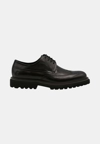 Chaussure habillée en cuir noir avec des détails de brogue, un bout rond et une semelle extérieure épaisse et texturée pour une meilleure adhérence. Conception à lacets.