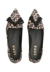 Leopard print flats with pointed toes, black tassel accents, and a smooth texture. Logo in gold on the inner side of the shoe.