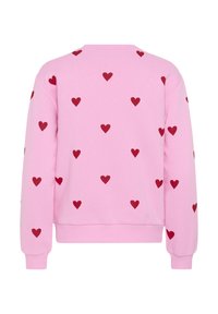Ružový sveter s dlhým rukávom, na zadnej strane a rukávoch sú rovnomerne rozmiestnené červené srdcové vzory, s rebrovanými manžetami a lemom.