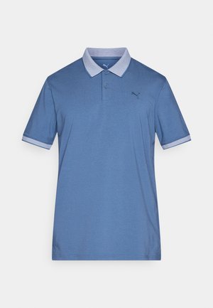 Blue polo shirt made of soft fabric, featuring a contrasting checkered collar and sleeve accents, with two buttons at the neck.
