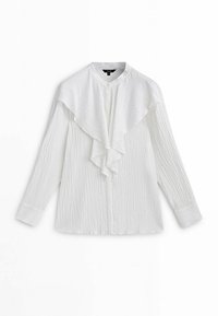 Chemise blanche à manches longues avec tissu texturé, grand col à volants et coupe droite. Design simple des poignets complète le look.