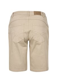 Beige bomullsshorts med två bakfickor med dekorativ sömnad och en liten läderetikett vid midjan.
