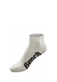Hellgraue Knöchelsocke aus weichem Stoff mit einem gerippten Bund. Verfügt über ein auffälliges schwarzes "Bench."-Logo an der Seite.