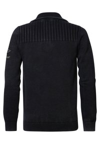 Black sweater with a ribbed texture on the back, featuring a collar and long sleeves. Includes subtle branding on the left arm.