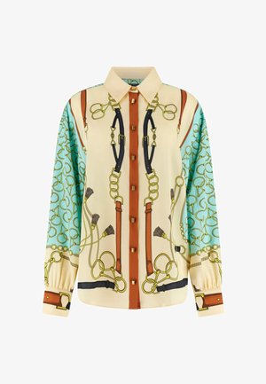 Blouse en soie à manches longues avec panneaux crème, turquoise et orange présentant des motifs de chaînes en or, ceinture et pampilles.