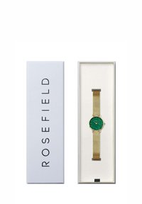 Grüne Zifferblatt-Uhr mit goldenem Mesh-Armband, präsentiert in einer weißen Schachtel mit der Aufschrift "ROSEFIELD." Bemerkenswerte Merkmale: minimalistisches Design und strukturierte Zifferblatt.
