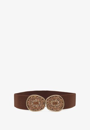 Cintura elastica marrone con due accenti circolari in perline dai toni terreni e dettagli metallici. Tessuto testurizzato, design sagomato.