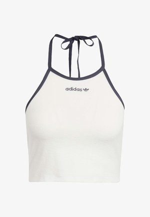 Haut halter court blanc en tissu doux, avec un liseré marine et des liens ajustables au cou. Logo "adidas" brodé à l'avant.