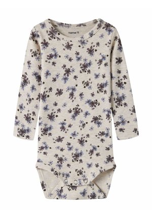 Body bébé beige à manches longues avec petit imprimé floral violet et bleu et boutons-pression à l’entrejambe.