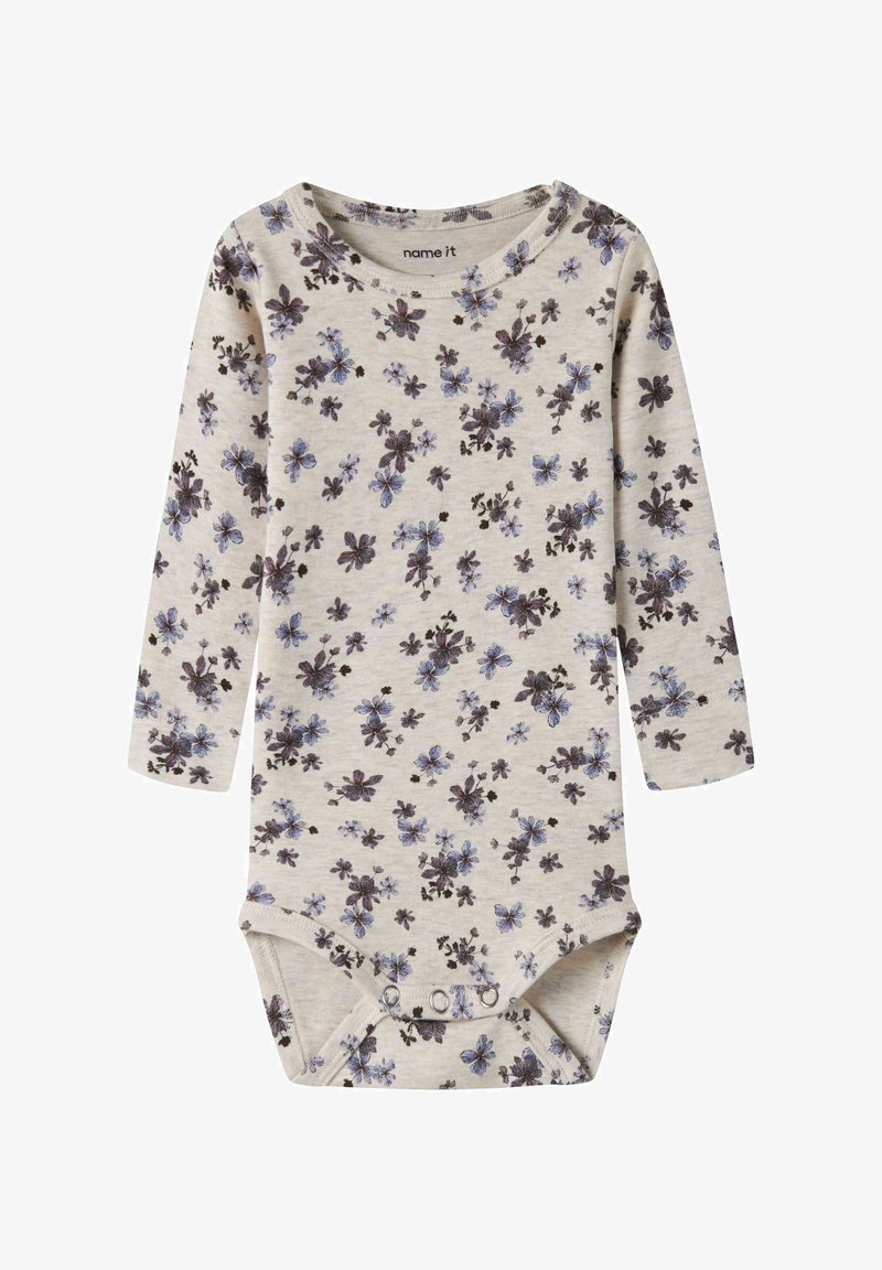 Body bébé beige à manches longues avec petit imprimé floral violet et bleu et boutons-pression à l’entrejambe.