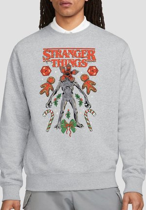 NETFLIX, STRANGER THINGS CHRISTMAS DEMOGORGON, DICE, CANES AND COOKIES - Sweatshirt - mottled light grey