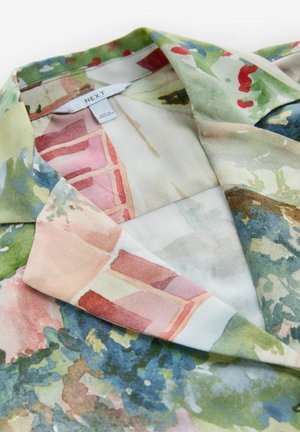 Floral-patterned blouse featuring a mix of green, pink, and blue hues. Made of lightweight fabric with a notched collar and soft texture.