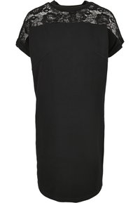 Robe noire à manches courtes avec un détail en dentelle sur le haut de la poitrine et les épaules, avec un col rond et une coupe ample.