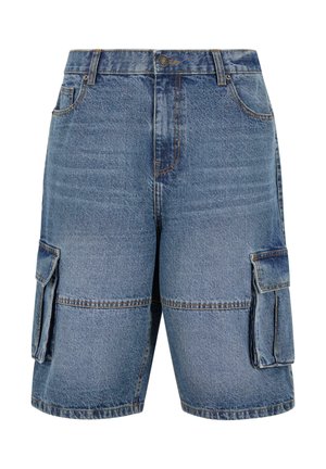 Săndale din denim de culoare albastru deschis, cu multiple buzunare laterale, o talie clasică și detalii cusute. Textură uzată și estompată.