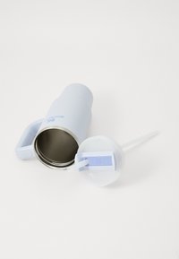 Light blue insulated tumbler with a handle, stainless steel interior, matching lid, and a straw. Features a logo on the side.