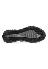 Black rubber sole with deep, multi-directional treads for traction, featuring a textured gray section and Michelin branding.