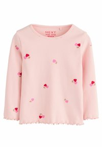 Rosa ribbet langærmet top med bølget kant og spredte broderede hjertepatter i rød, lyserød og beige. Har en rund halsudskæring.