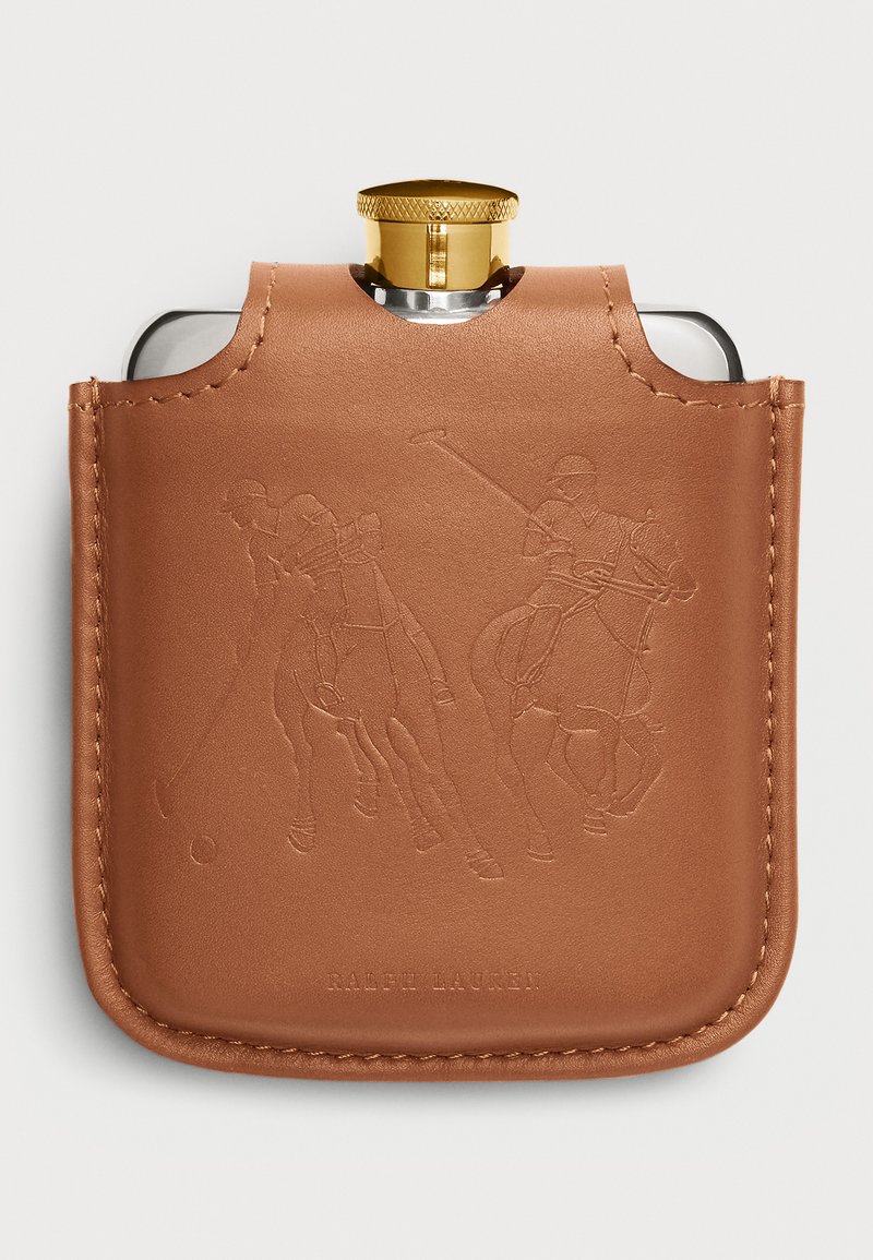 Stainless steel flask encased in tan leather, featuring embossed polo players, gold-colored screw cap, and beige stitching.