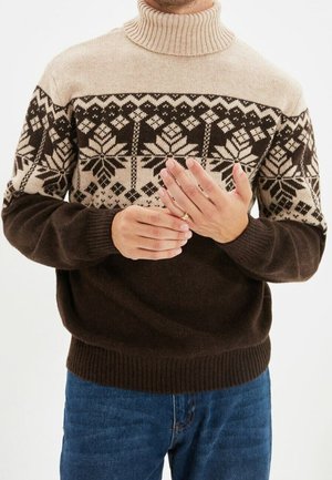 Braun-beige Rollkragenpullover mit Schneeflockenmuster und gerippten Bündchen. Aus Strickmaterial gefertigt; entspannte Passform.