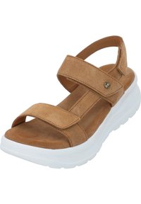 Beige Wildledersandale mit zwei verstellbaren Klettverschlüssen und einer dicken weißen Gummisohle. Offenes Design an der Zehenpartie mit strukturiertem Fußbett.