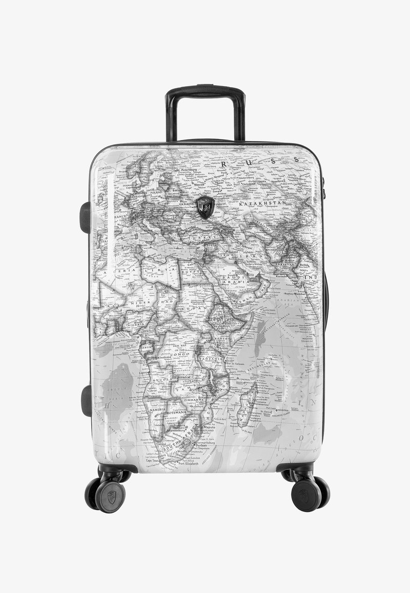 Valise rigide blanche avec un design détaillé de carte noire, équipée de quatre roues, d'une poignée rétractable et d'un emblème logo à l'avant.