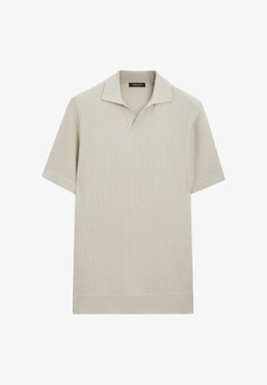 Polo a maniche corte in maglia a coste color beige chiaro con collo aperto, vestibilità sagomata e etichetta Massimo Dutti all'interno del collo.