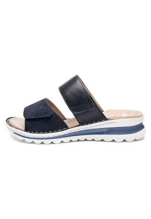 Navy blue slide sandal with two adjustable straps, cushioned beige footbed, and white sole with blue accent and textured tread.