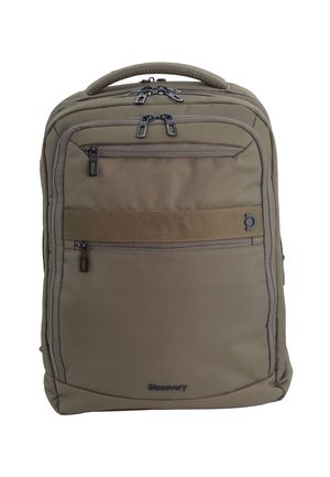 Compact brown backpack with multiple zippered compartments, top carrying handle, and "Discovery" logo on the front pocket.