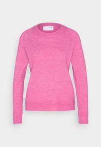 Rosa ulltröja med rund halsringning, långa raglansärmar, ribbade muddar och halsringning samt en mjuk, texturerad finish.