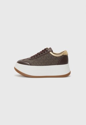 Brown patterned sneakers with a smooth leather toe, gold accent at the heel, and a white platform sole with a textured brown outsole.
