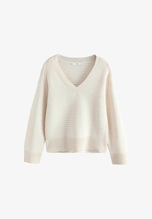 Kreminės spalvos raštuota mezginė megzta palaidinė su V formos iškirpte, ilgomis rankovėmis ir plačiomis apykaklėmis, pagaminta iš tekstūruoto audinio.