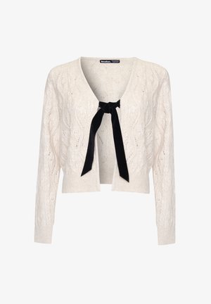 Knit cardigan in cream with a textured pattern, featuring long sleeves and a black velvet bow tie closure at the front.