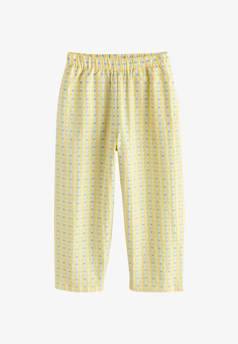 Rumene hlače z elastičnim pasom s modro-belim karo vzorcem in majhnimi srčnimi oblikami, prikazane na belem ozadju.
