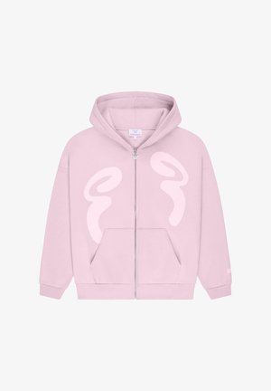 Rosa zip-up hettegenser med et stort hvitt abstrakt design på fronten. Har hette og frontlommer. Behagelig stofftekstur.